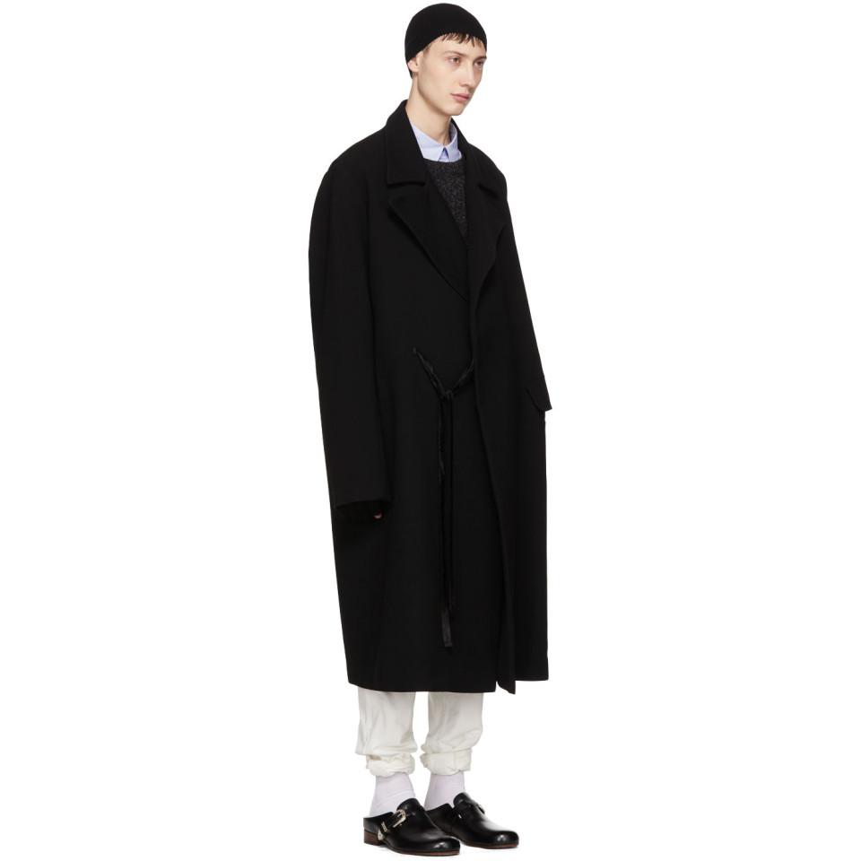black wool tailored coat