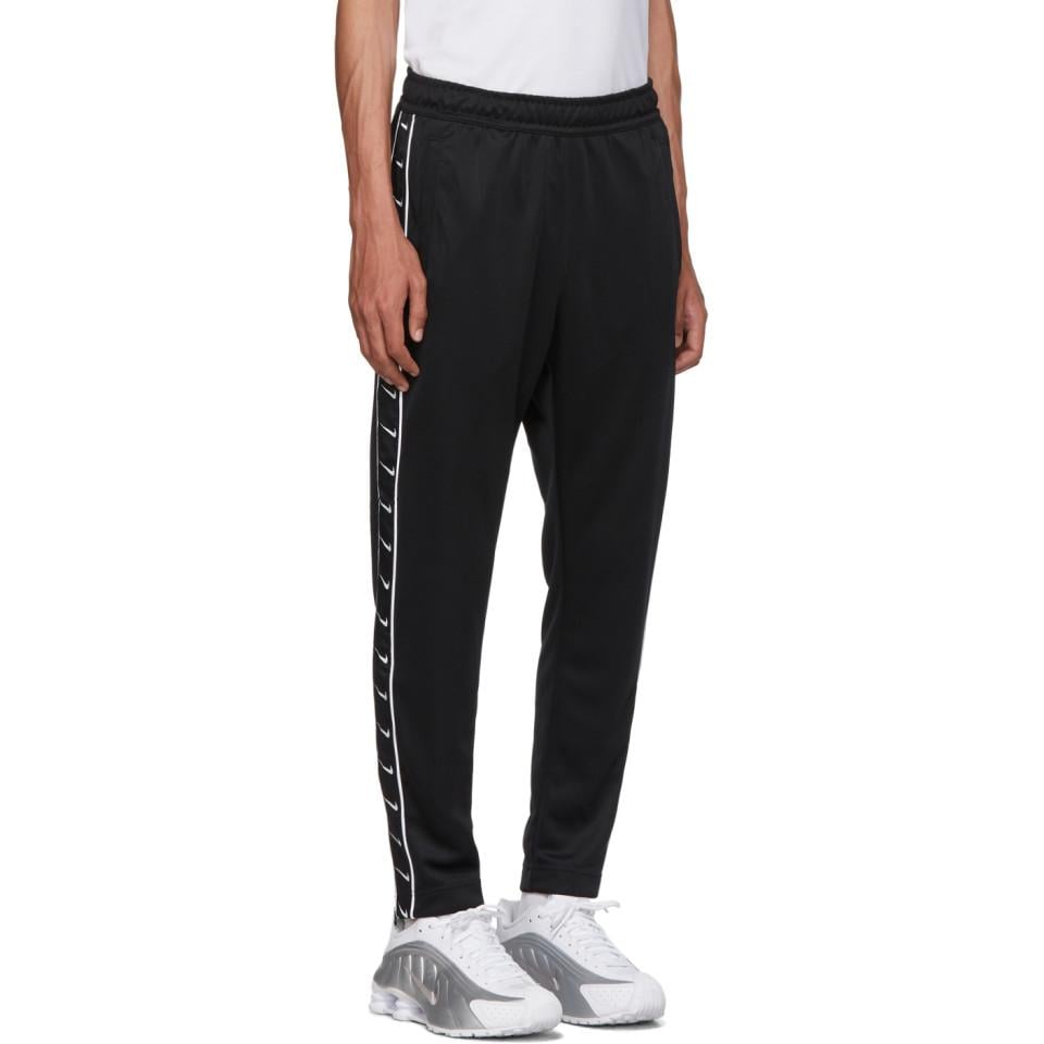 Nike Black Swoosh Tape Track Pants for Men - Lyst