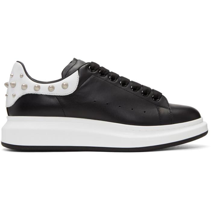 black trainers with studs