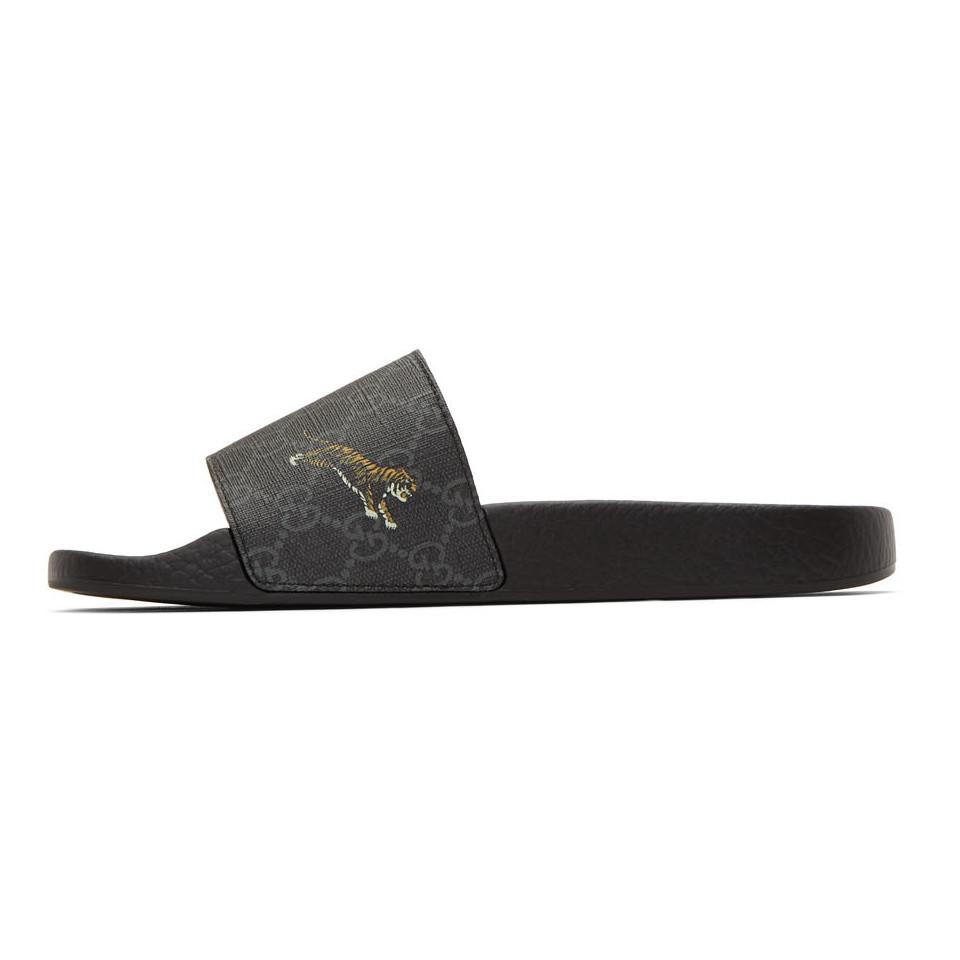 black gg supreme pursuit sandals