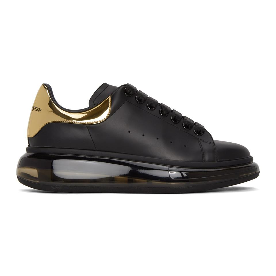 Ungkarl børste Konsekvenser Alexander McQueen Oversized Leather Sneakers Black/gold for Men - Lyst