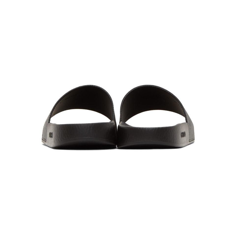 black gg supreme pursuit sandals