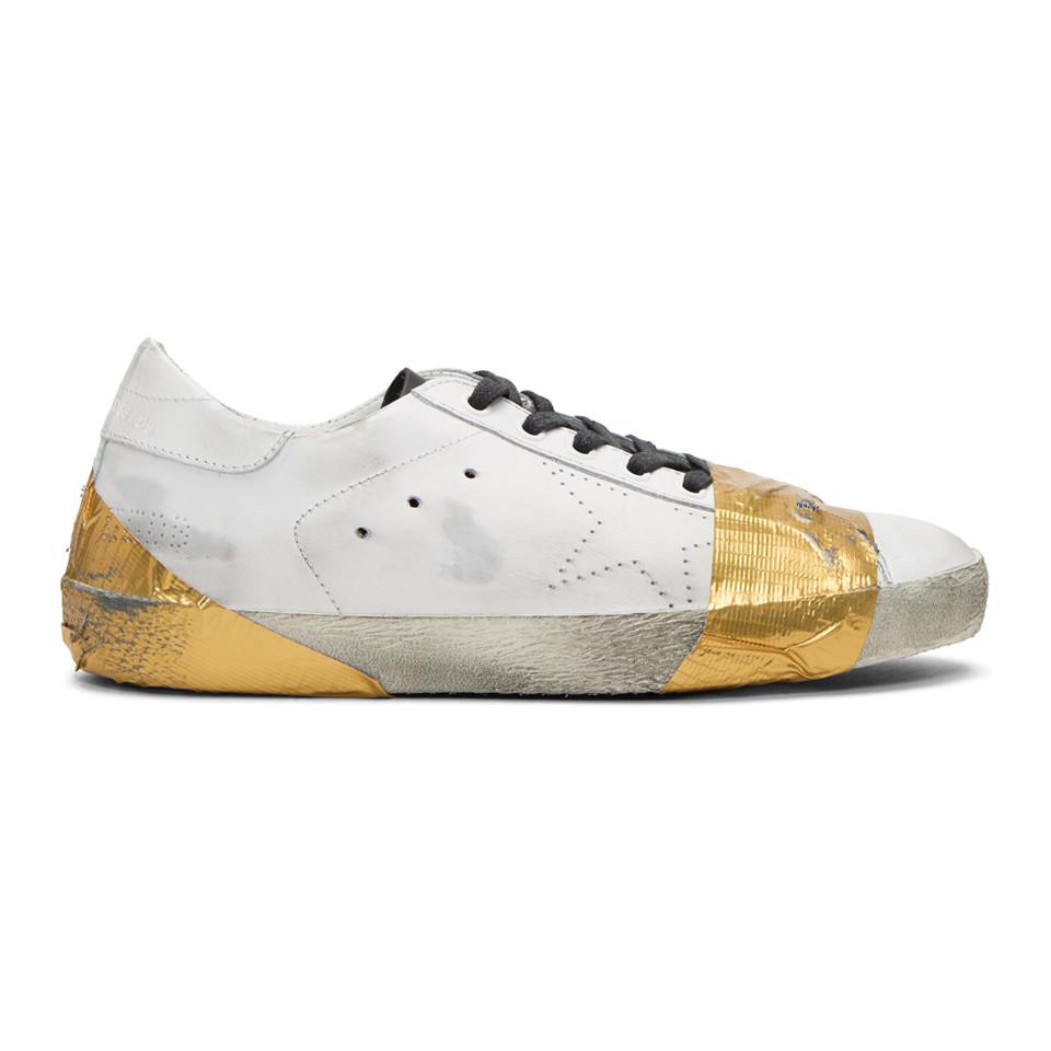 golden goose taped sneakers