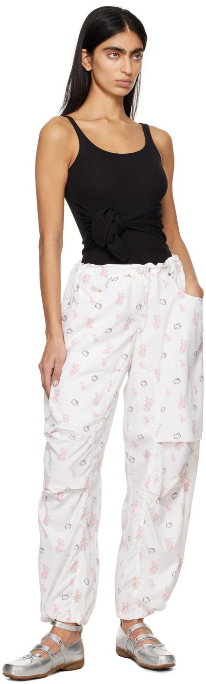HELLO KITTY X YY PARACHUTE PANTS, WHITE