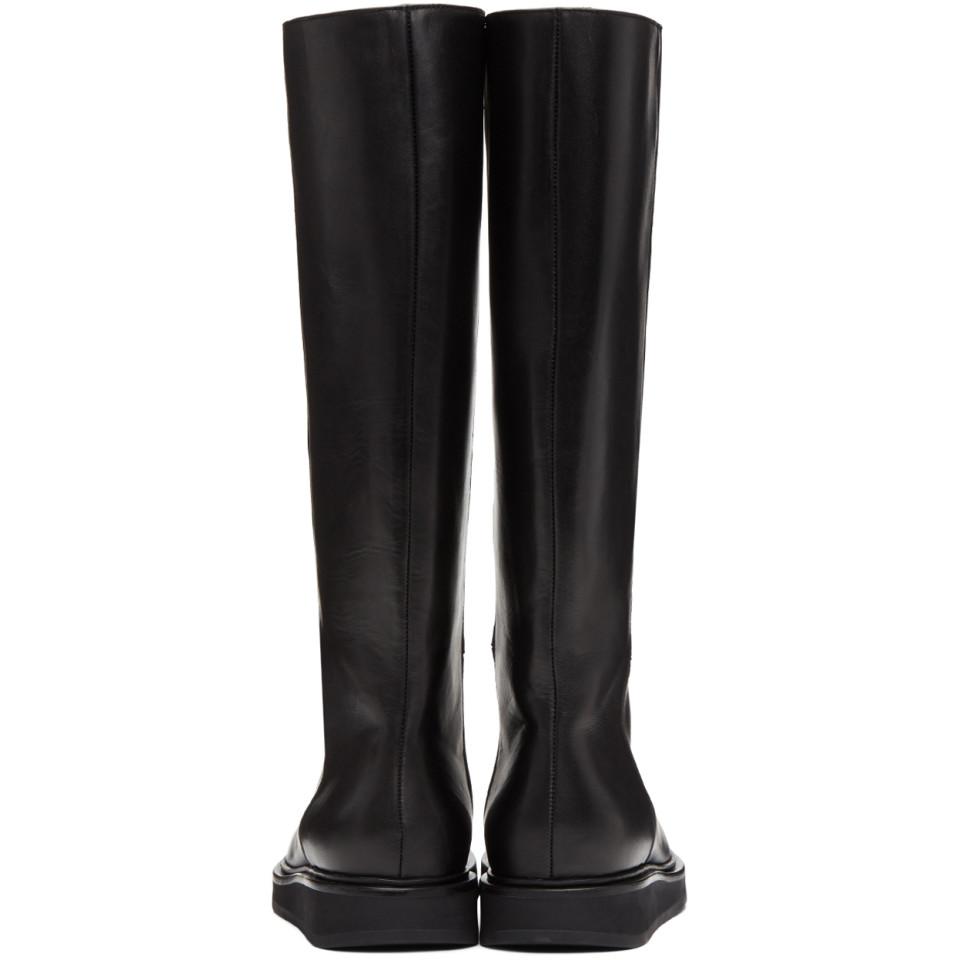 black wedge riding boots