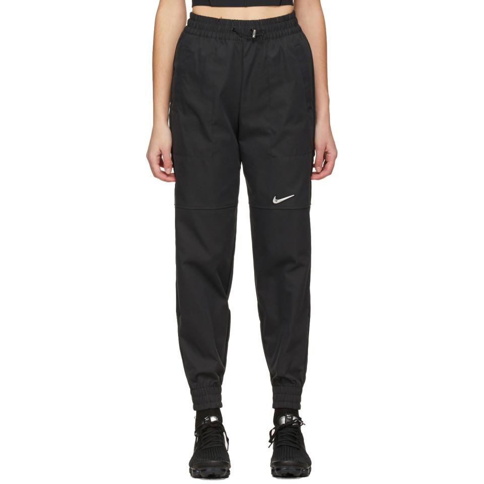 Nike Black Woven Sportswear Swoosh Lounge Pants - Lyst