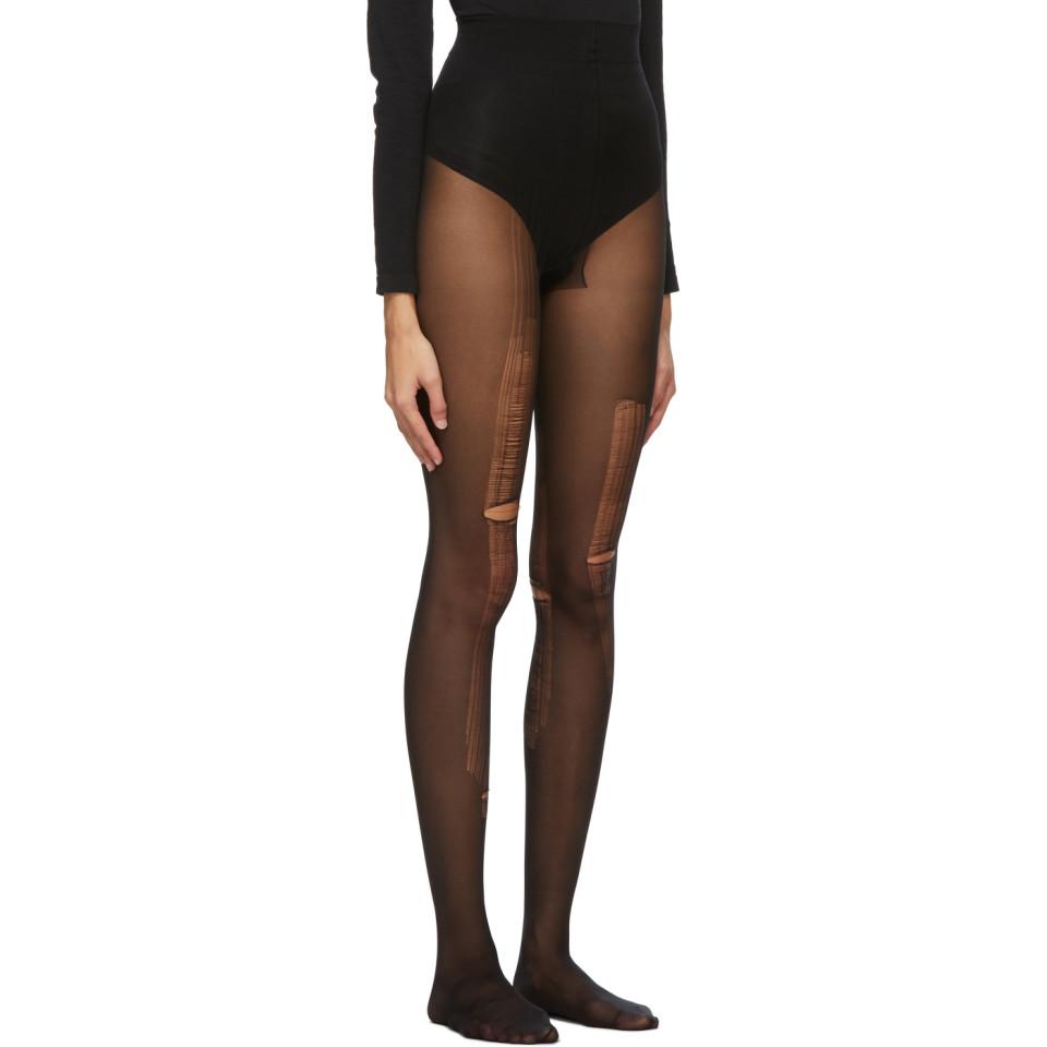 gucci distressed tights