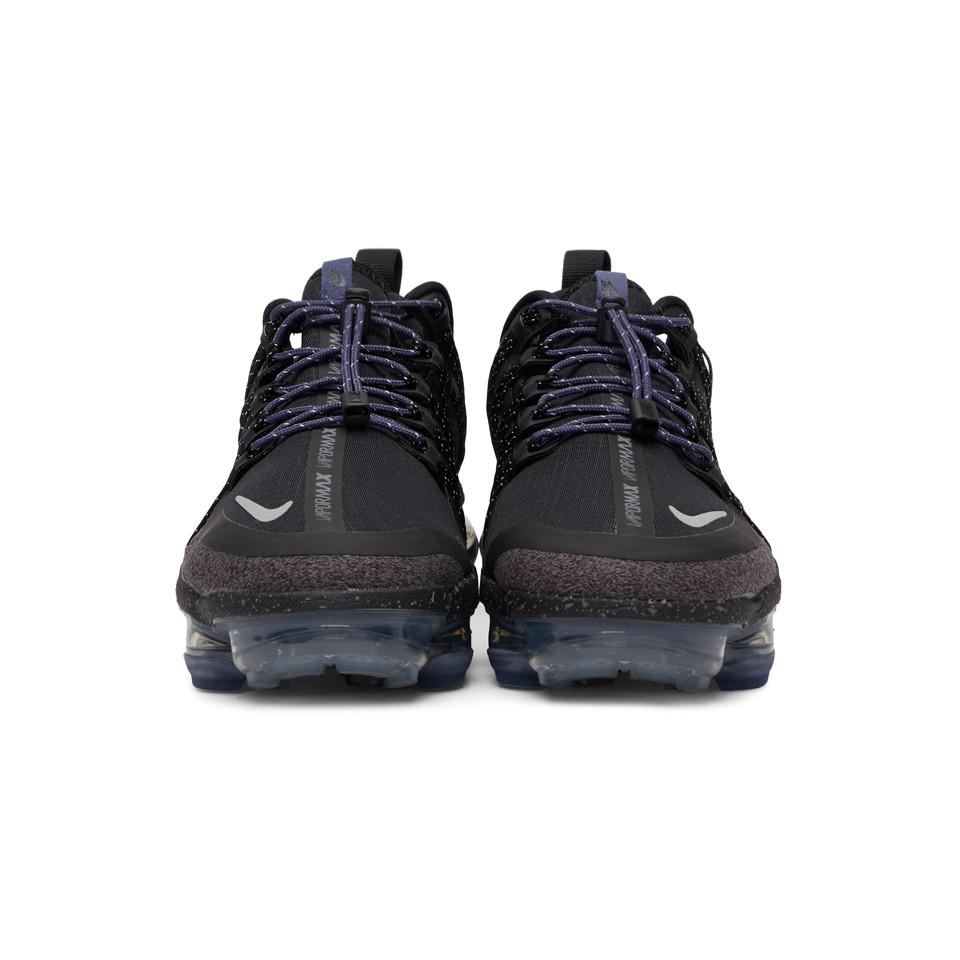 black & purple air vapormax run utility sneakers