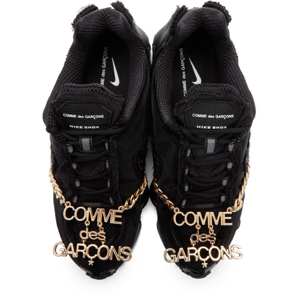 black nike edition cdg shox tl sneakers