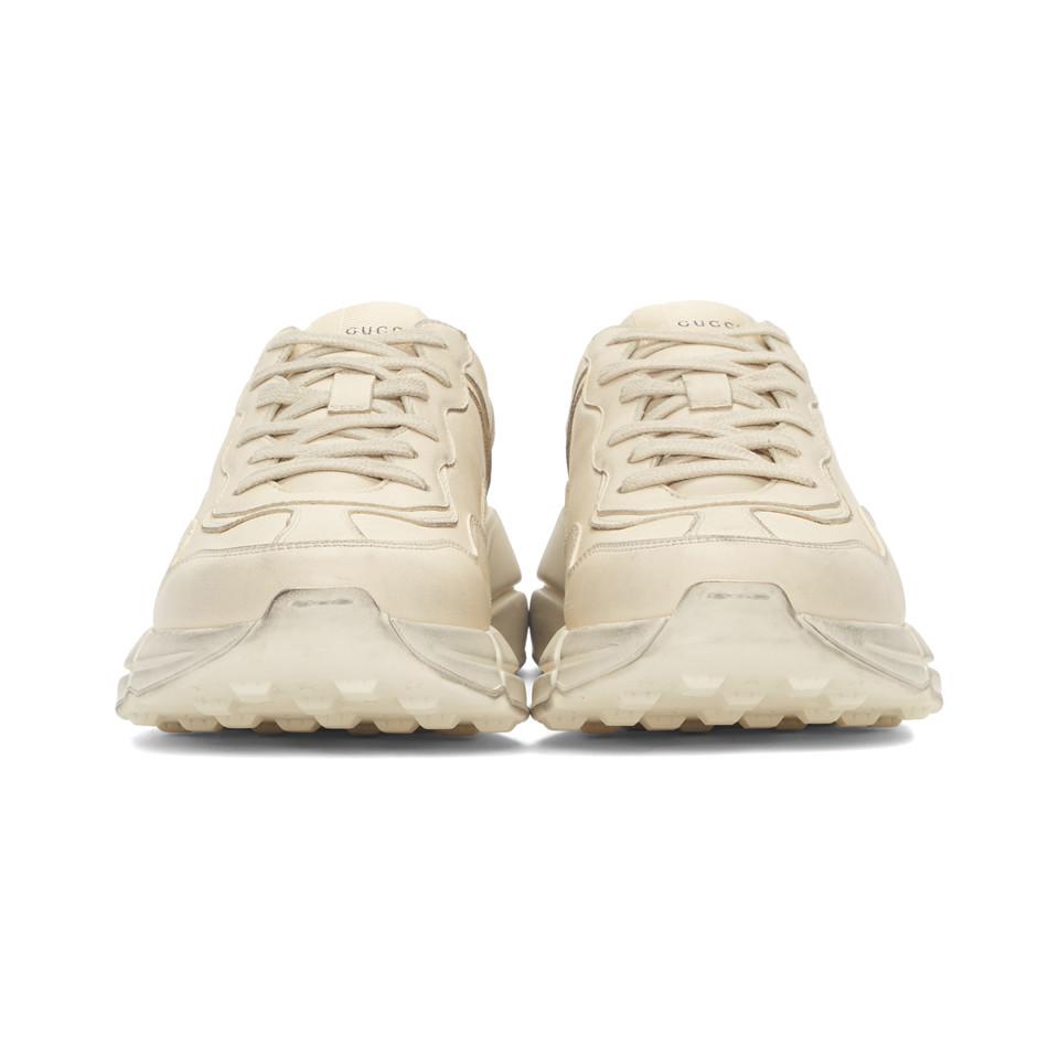 gucci rhyton distressed leather sneakers