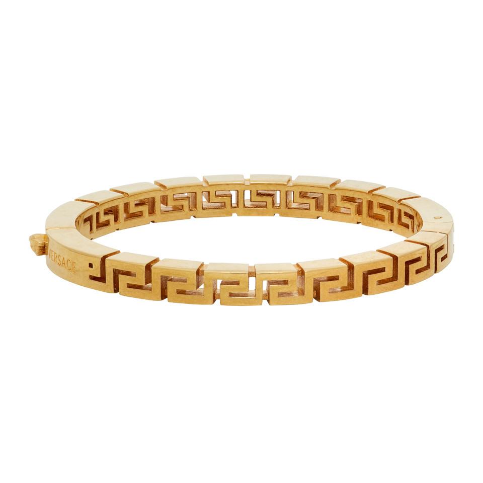Versace Greca Logo Bangle in Gold (Metallic) - Save 19% - Lyst