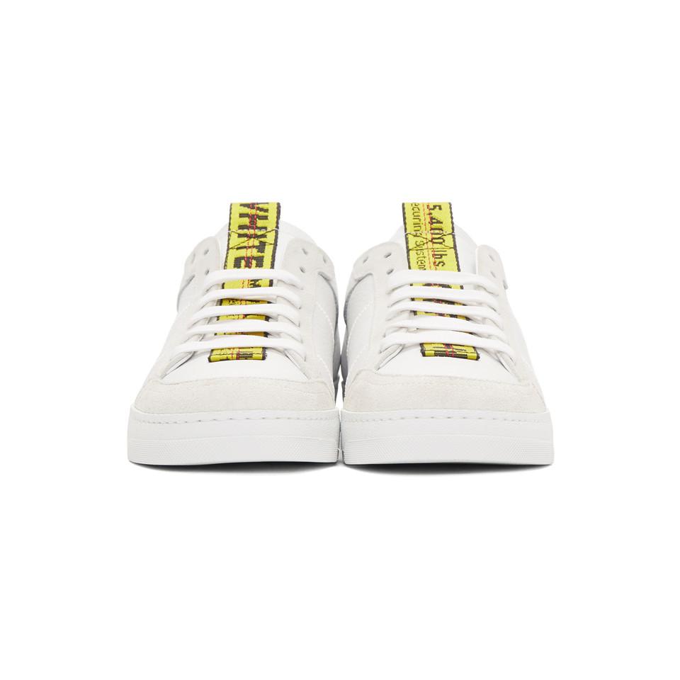 white and yellow sneakers