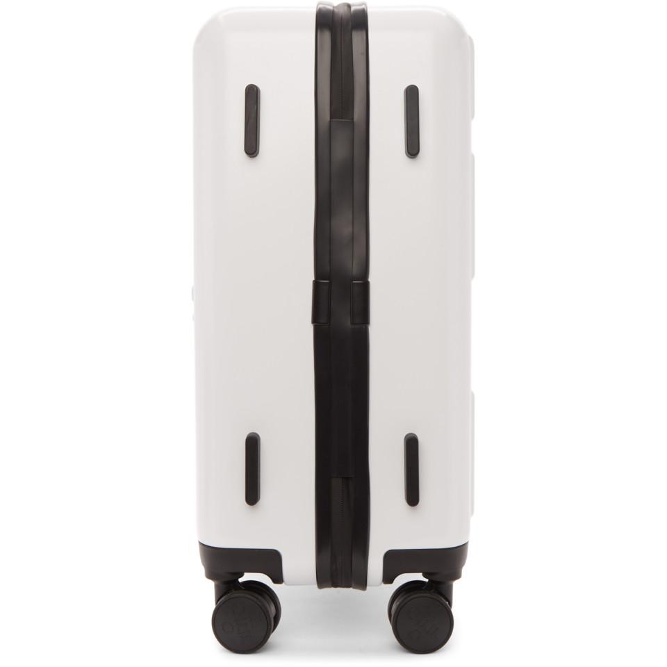 white plastic suitcase