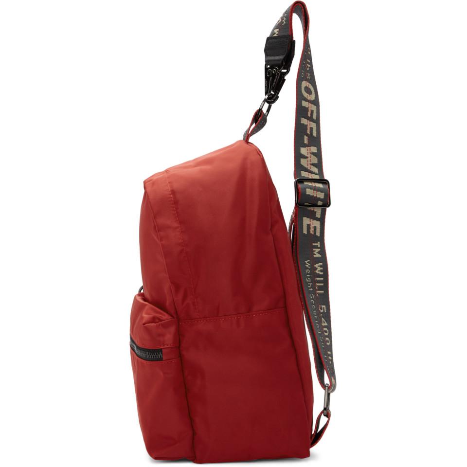 red backpack with white straps