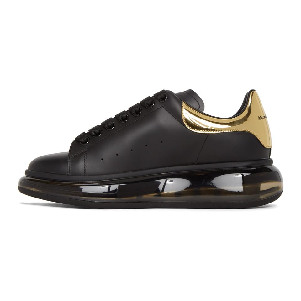 black and gold alexander mcqueen's