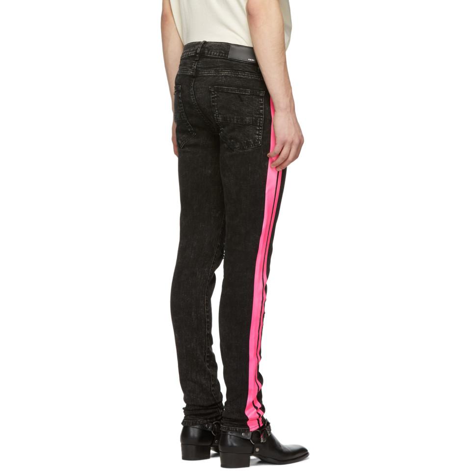 black and pink amiri jeans
