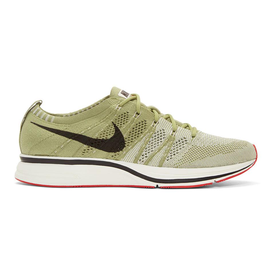 green flyknit trainer