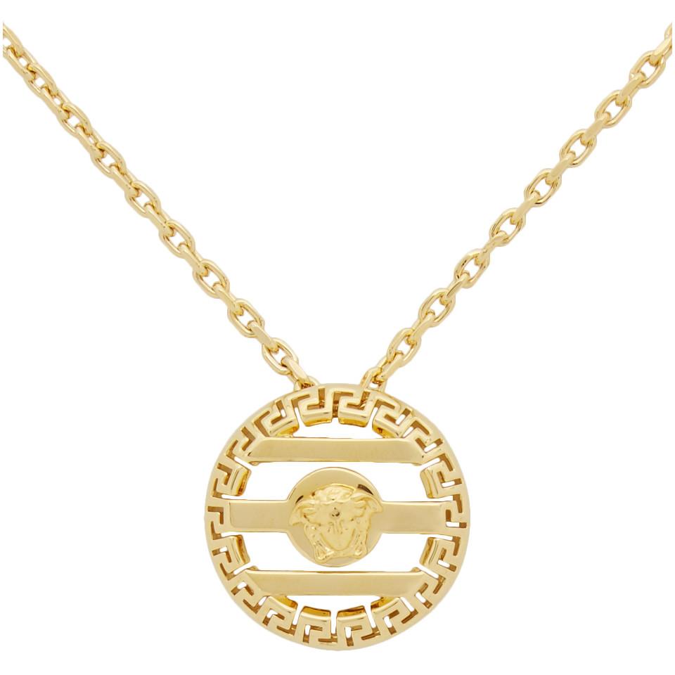 gold round cage medusa necklace