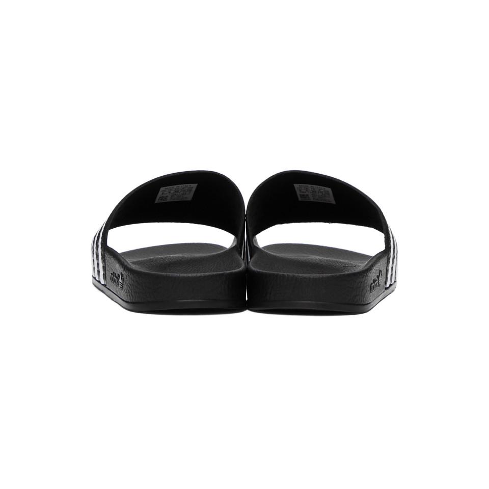 adidas Originals Rubber Black And White Adilette Slides for Men - Lyst