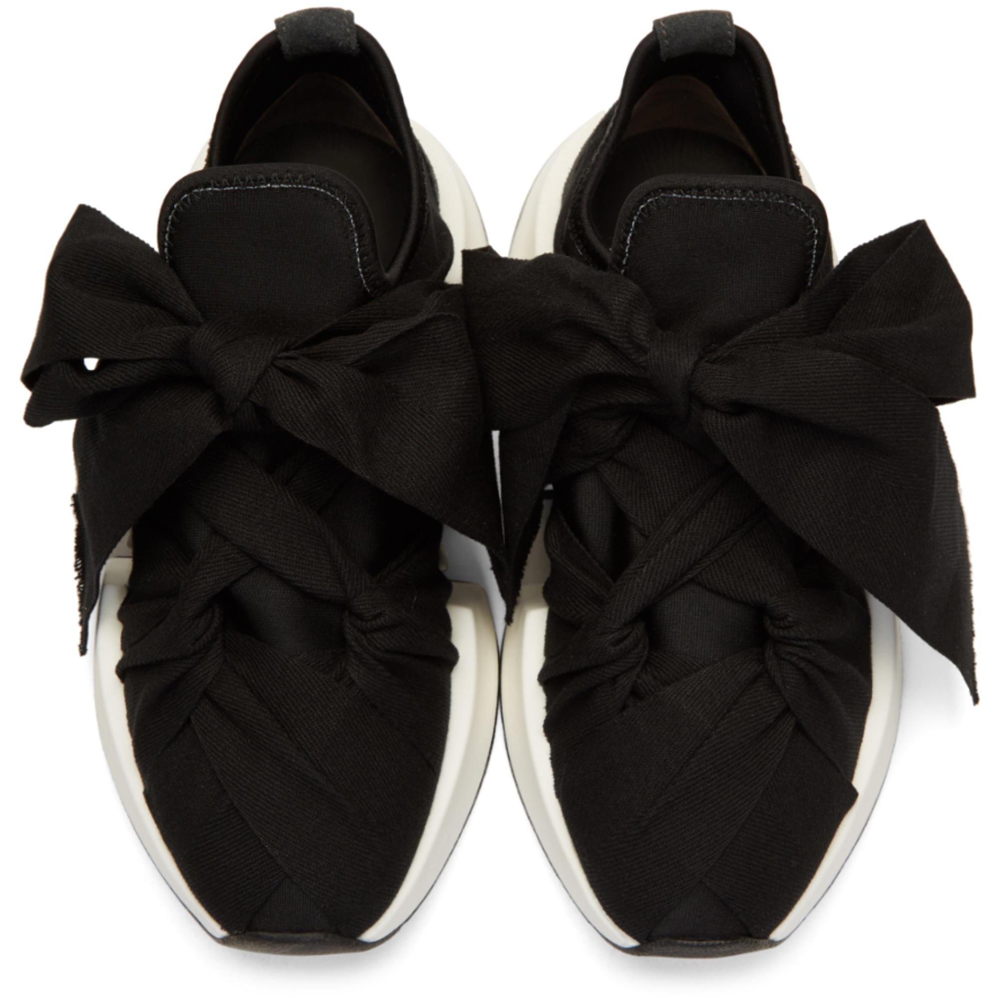 black bow sneakers