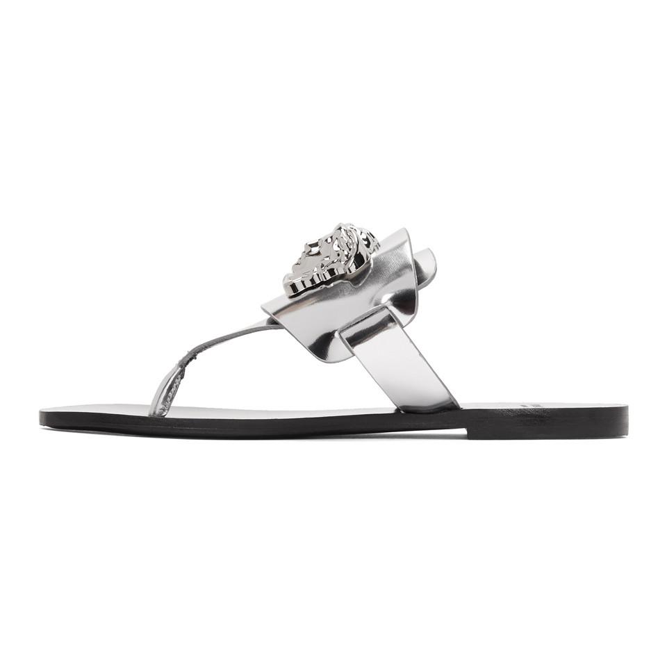 Versace Silver Palazzo Flat Thong Sandals in Metallic | Lyst