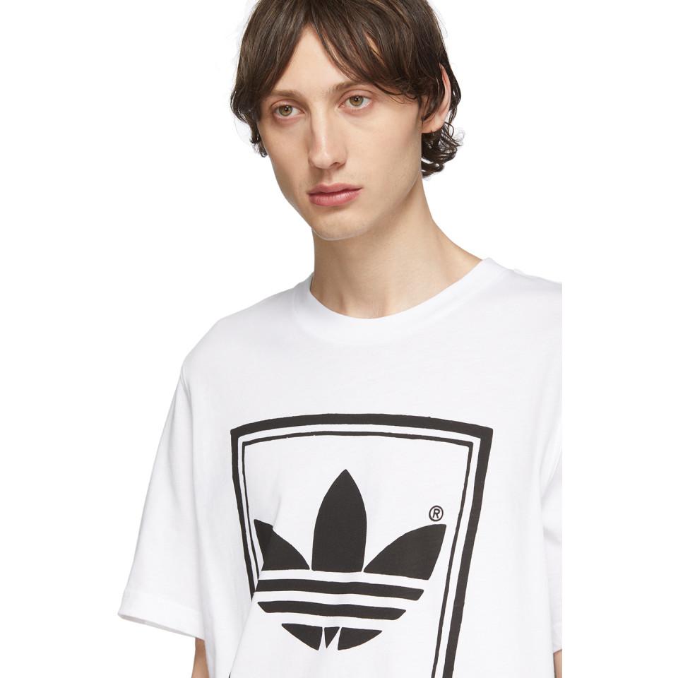 adidas logo backwards