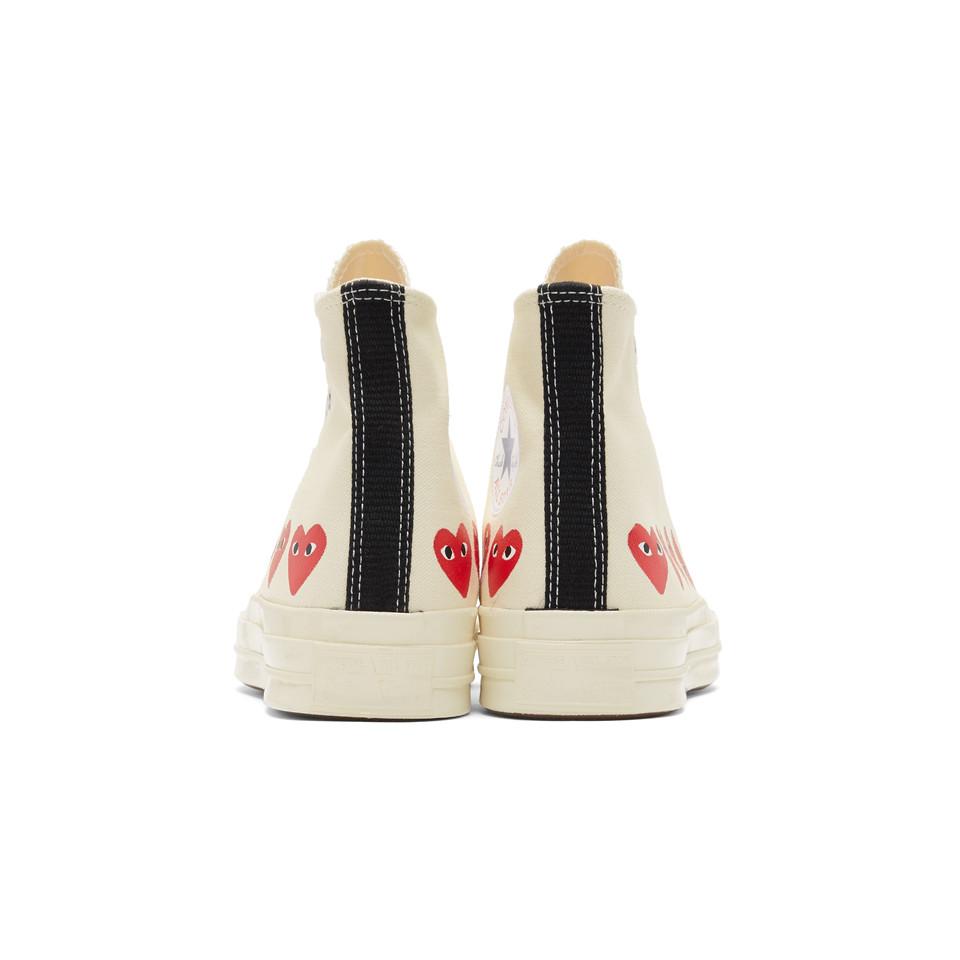comme des garcons converse high top multiple hearts