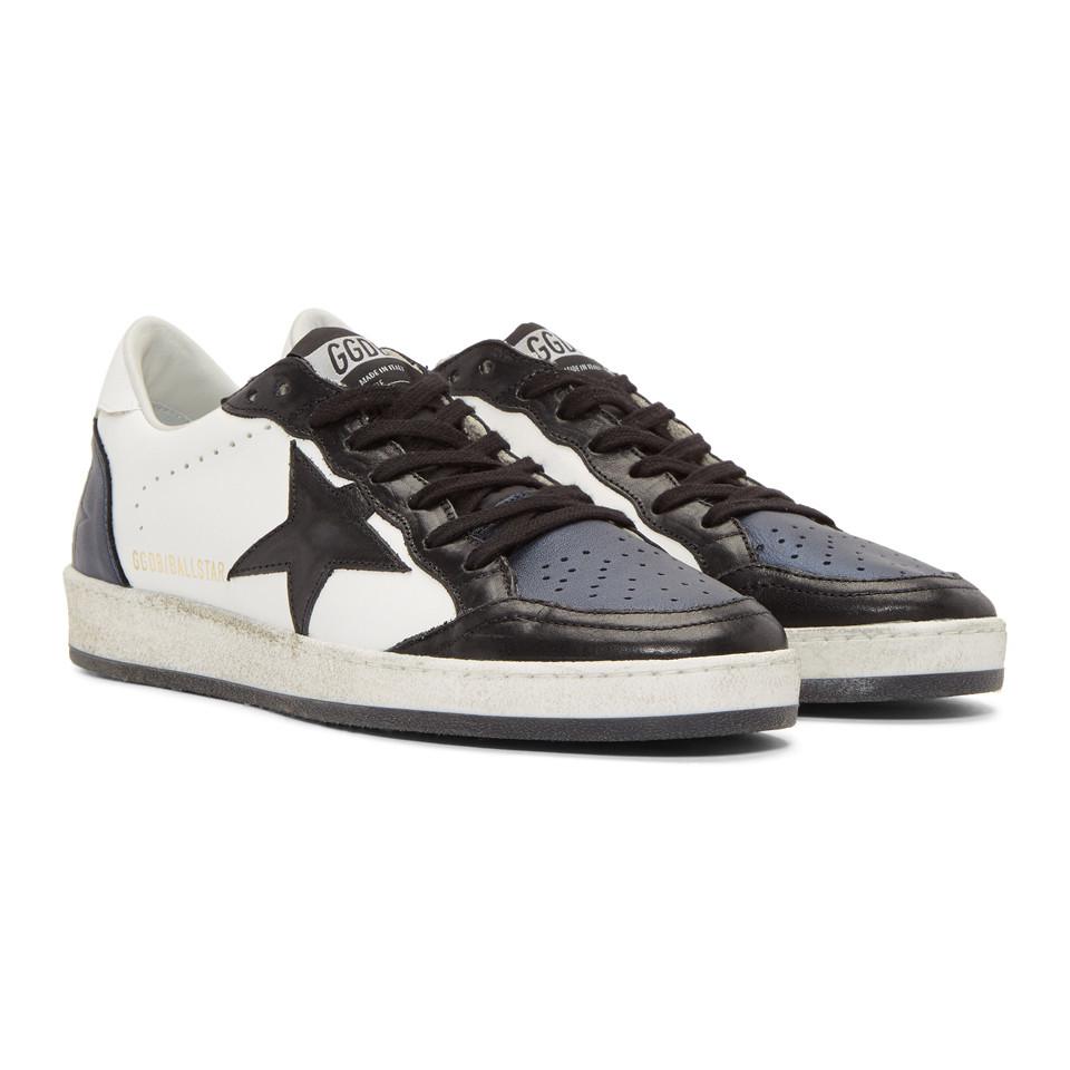 golden goose black and white sneakers