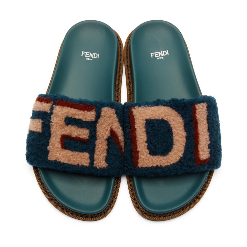 Fendi Leather Blue Shearling Logo Slides - Lyst
