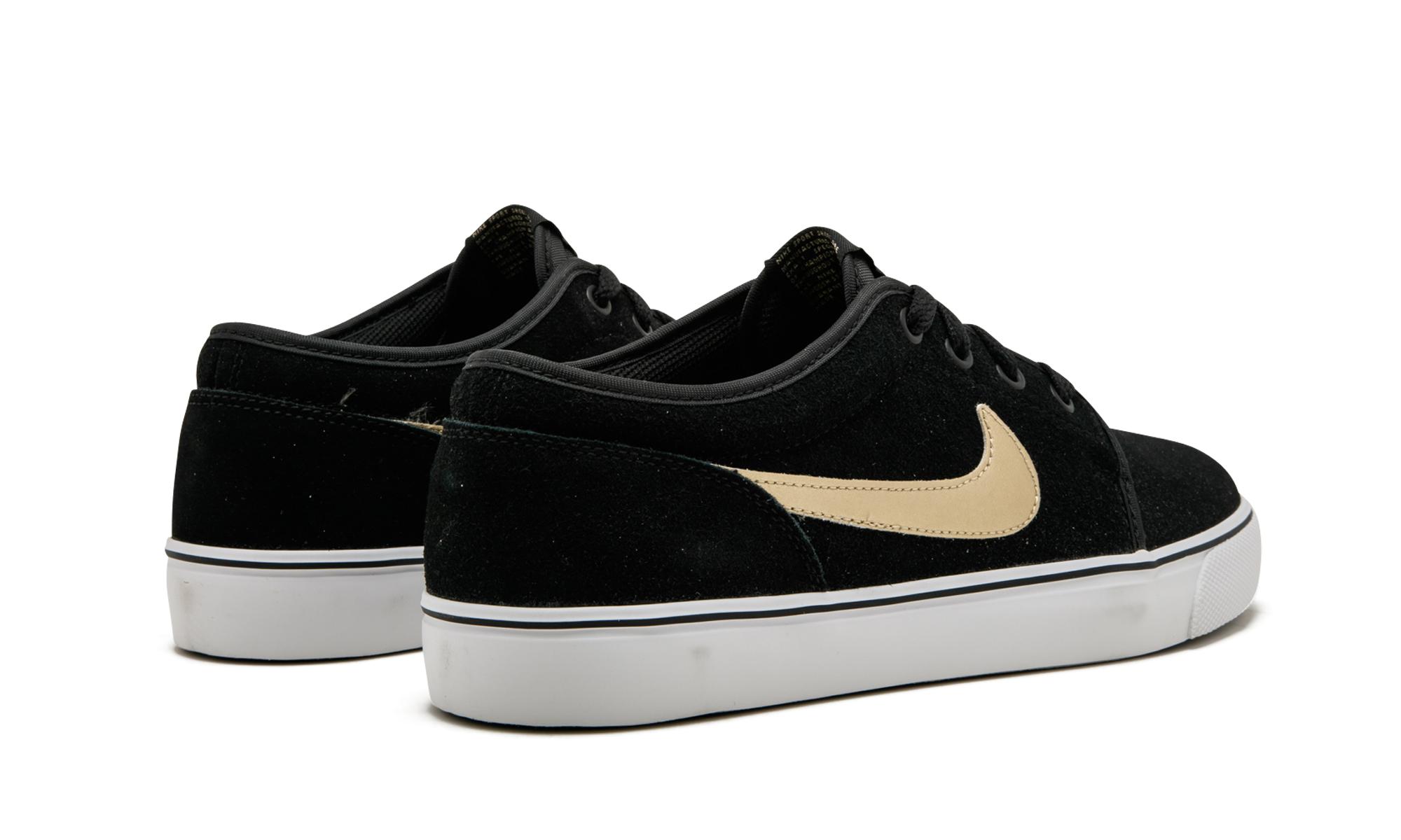nike toki leather