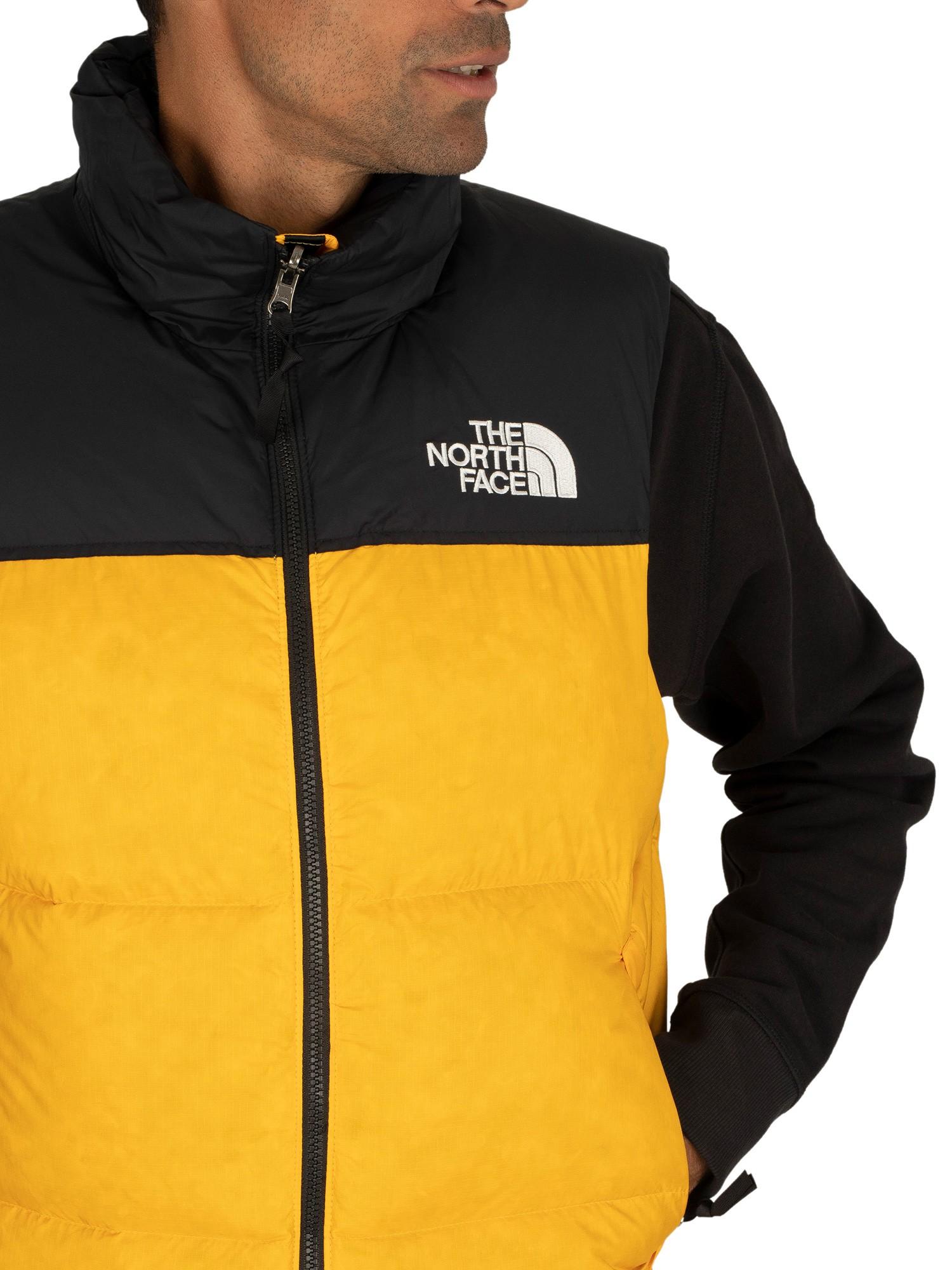 North face gilet black and yellow Outlet