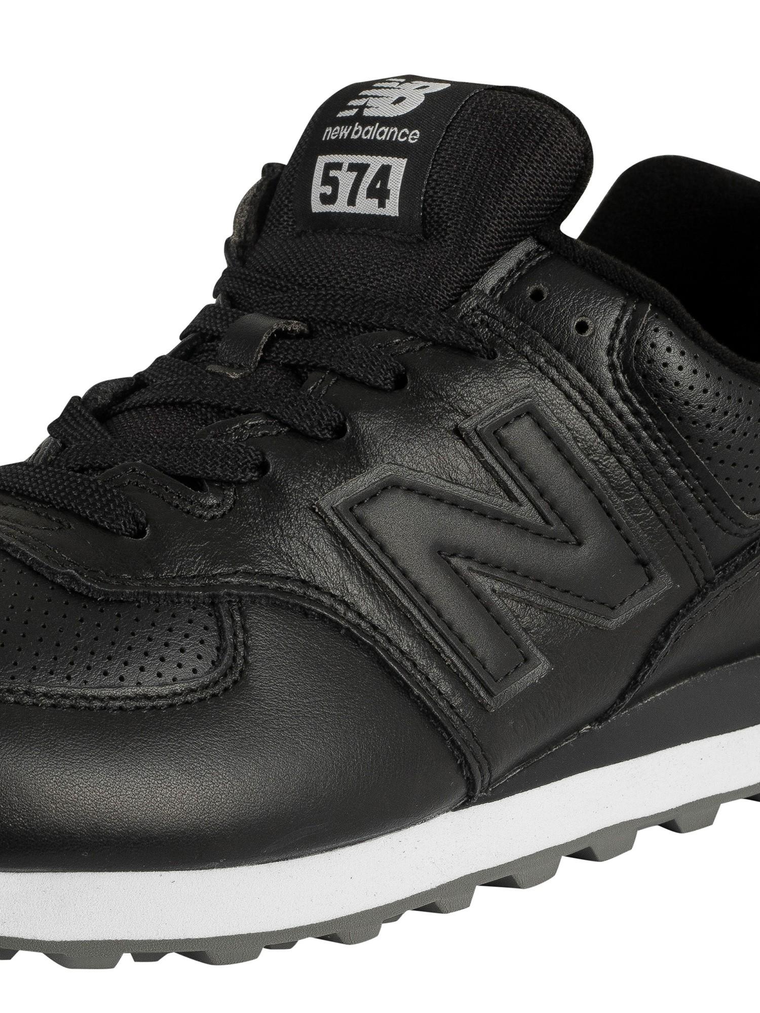 black leather new balance trainers