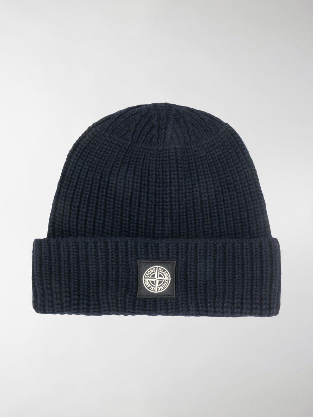 stone island hat with badge