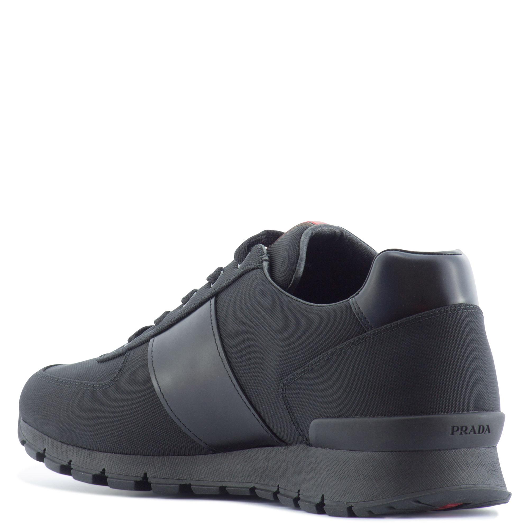 Prada Leather Low-Top Sneakers in Black for Men - Lyst