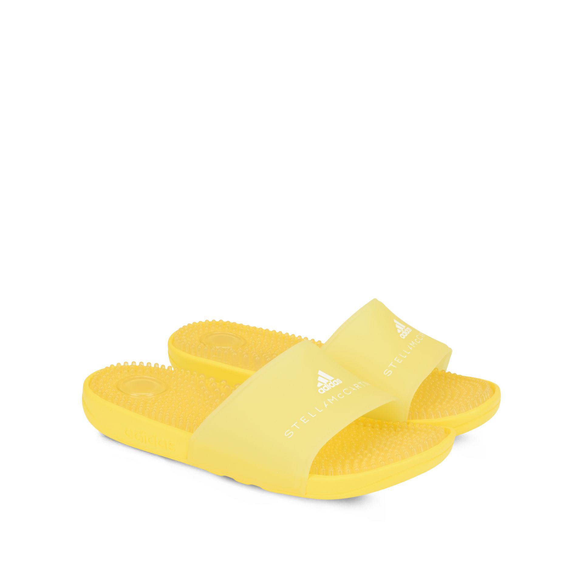 yellow adidas flip flops