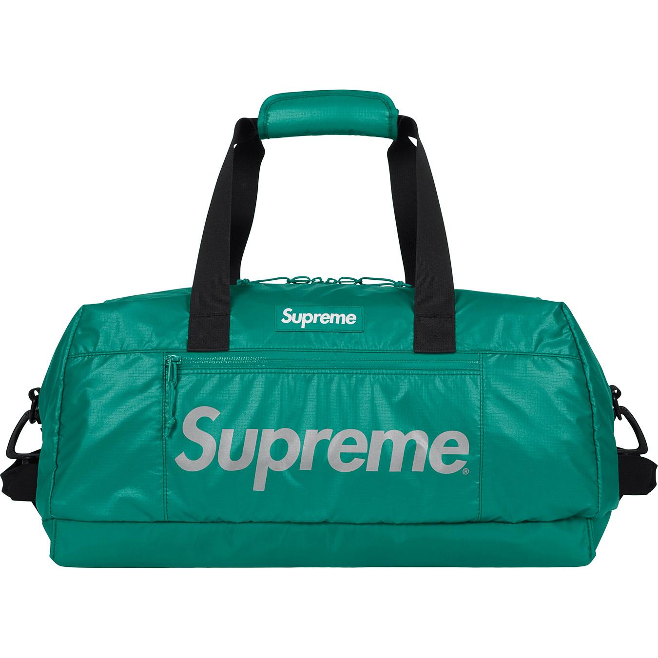 teal duffle bag