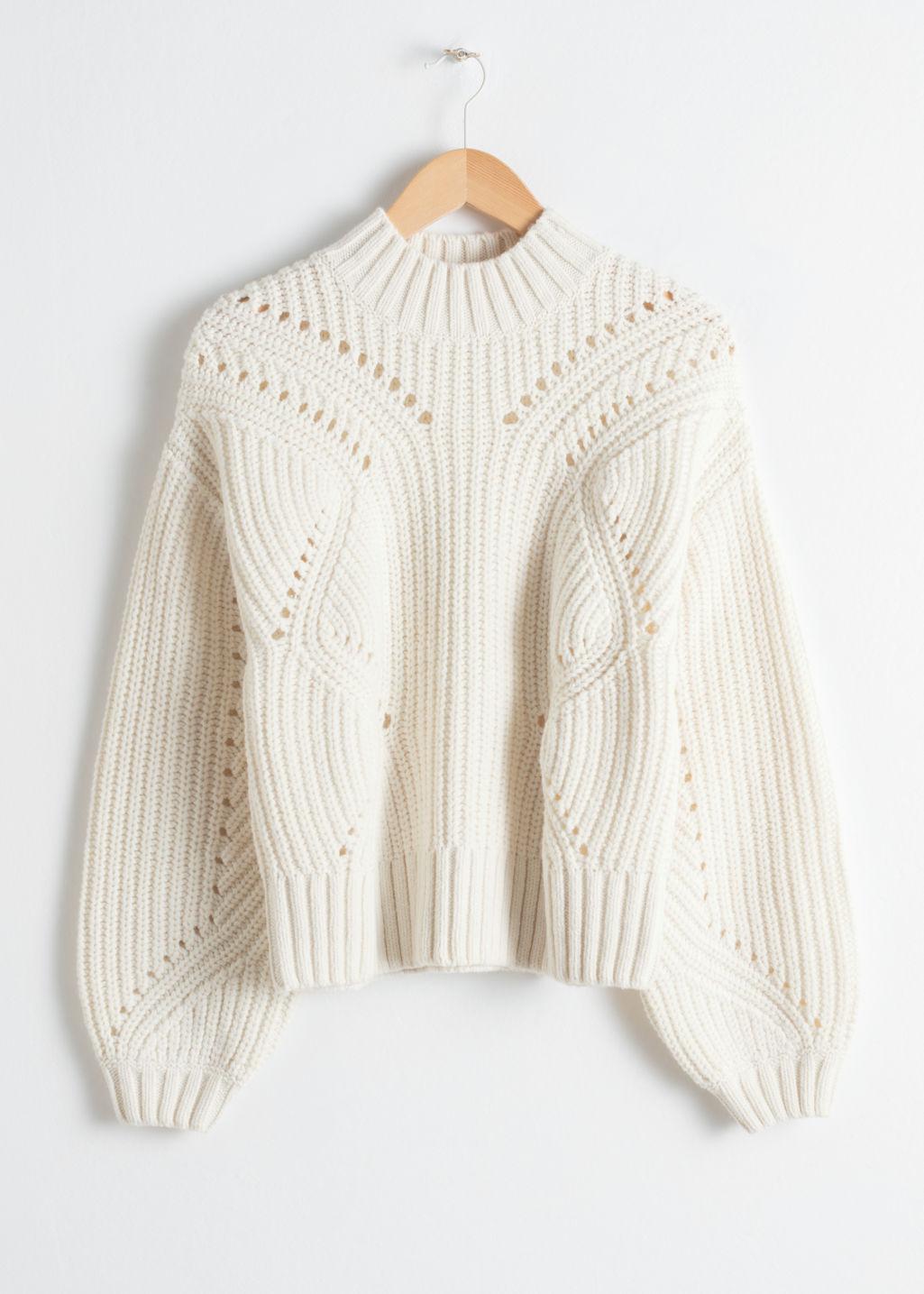 white boxy sweater