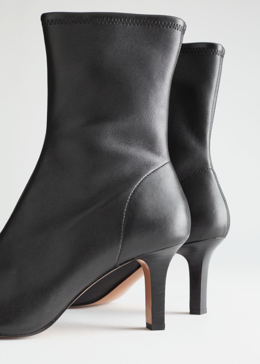 pointed black sock boots