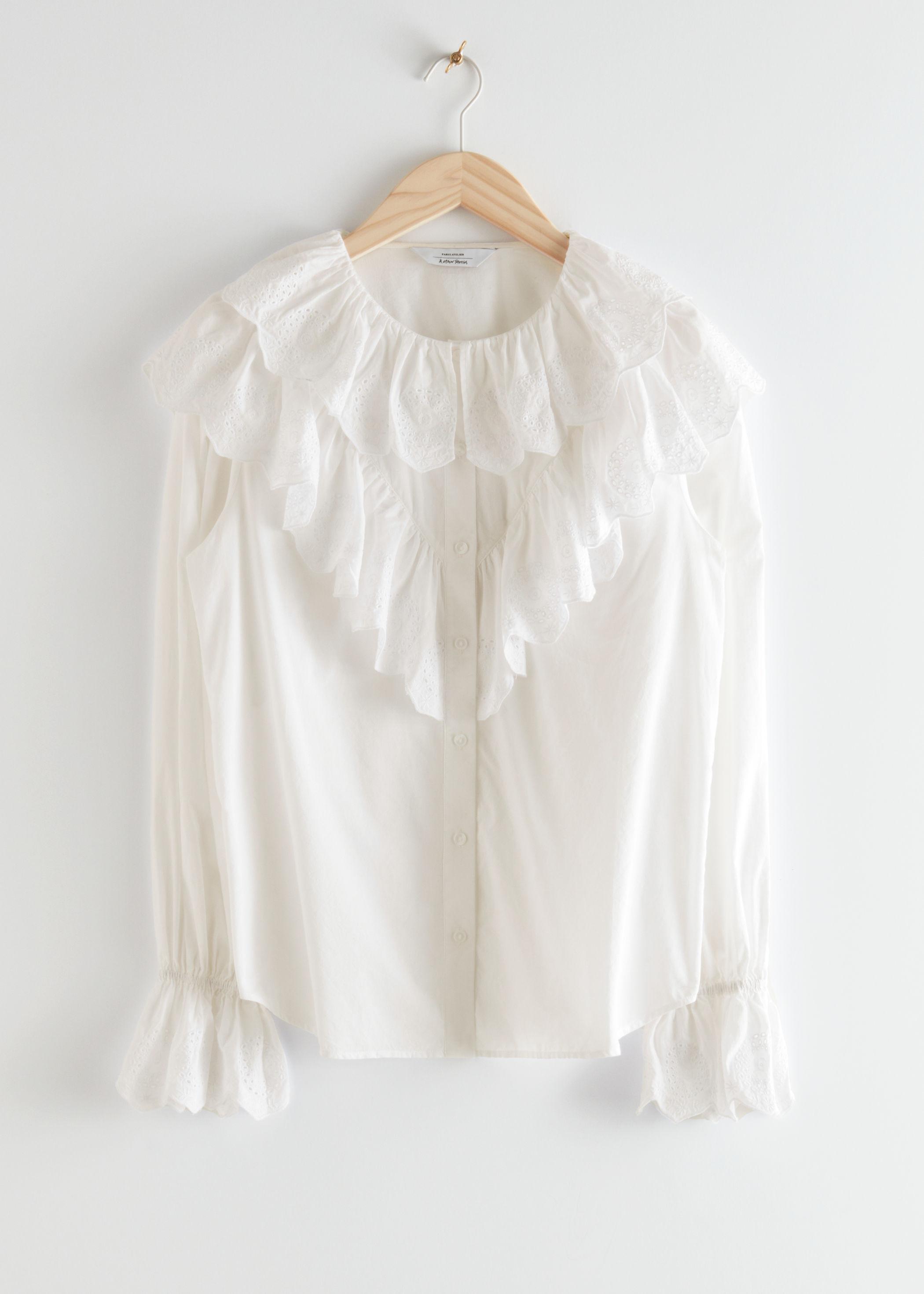 white button up blouse with ruffles
