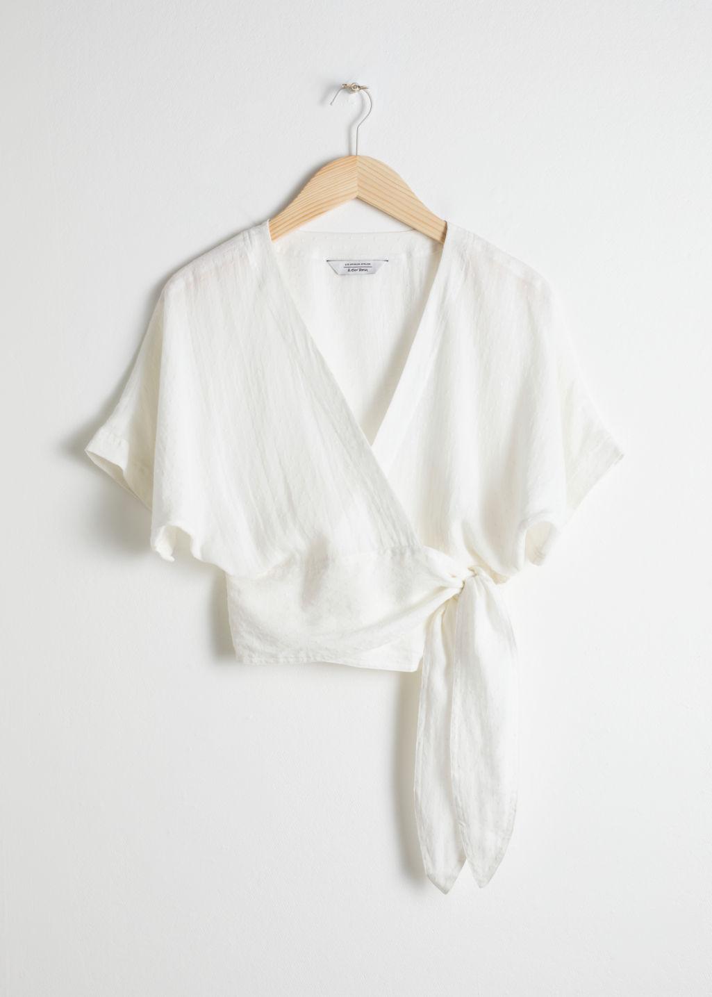 belted wrap blouse