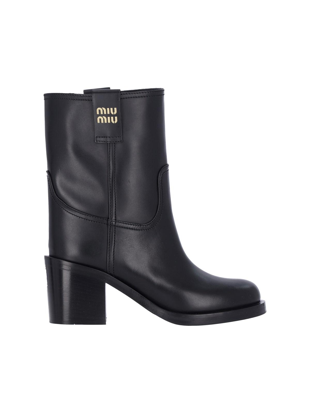 Miu Miu Logo Leather Ankle Boots in Black | Lyst