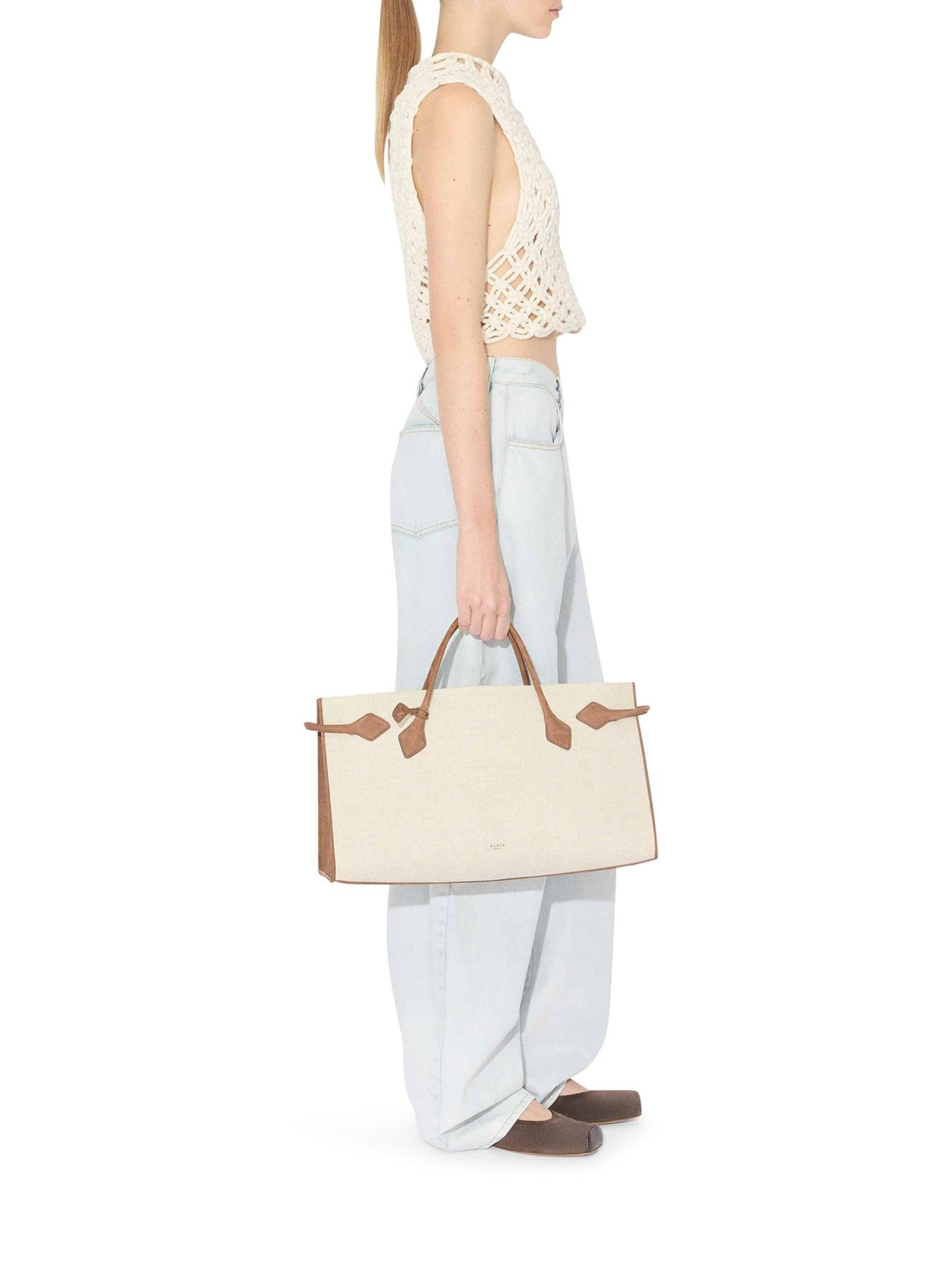 Alaïa Low Waist Rounded Jeans in White | Lyst
