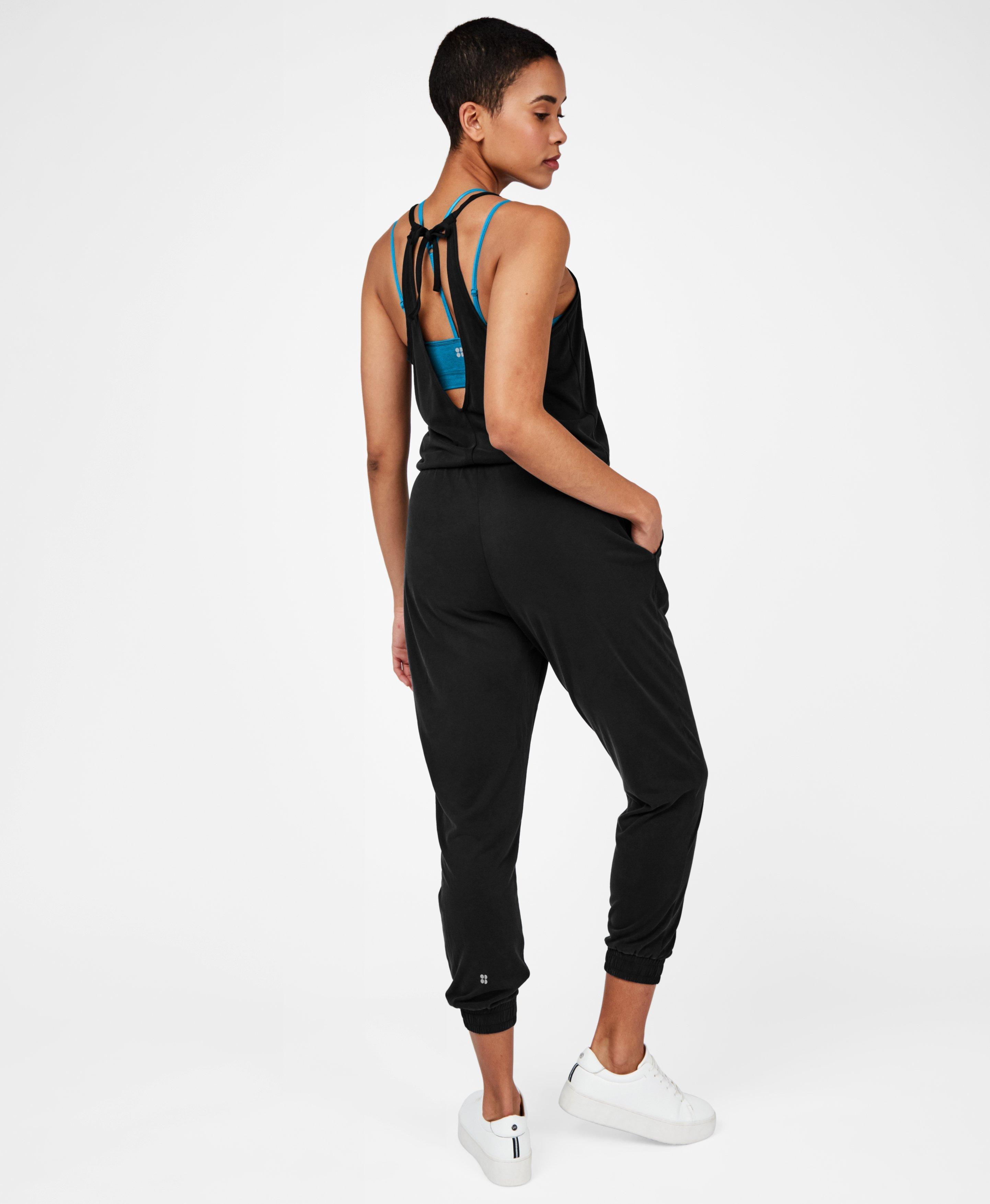 Sweaty Betty Open Back Racer Jumpsuit In Black Lyst