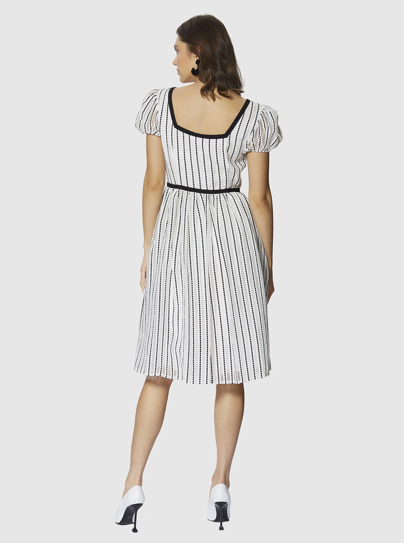 roman black and white dress
