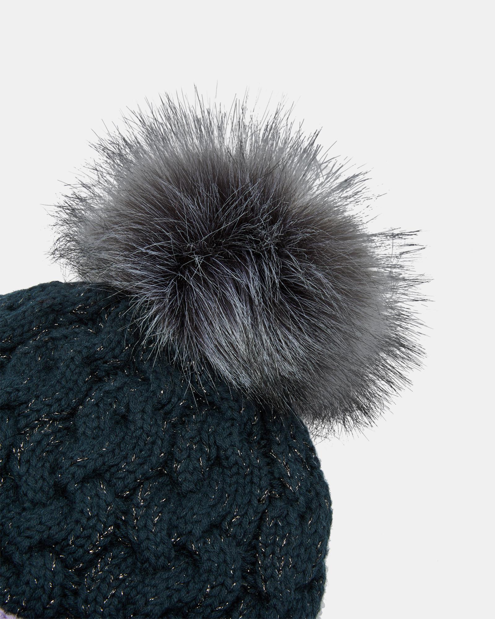 dark green bobble hat