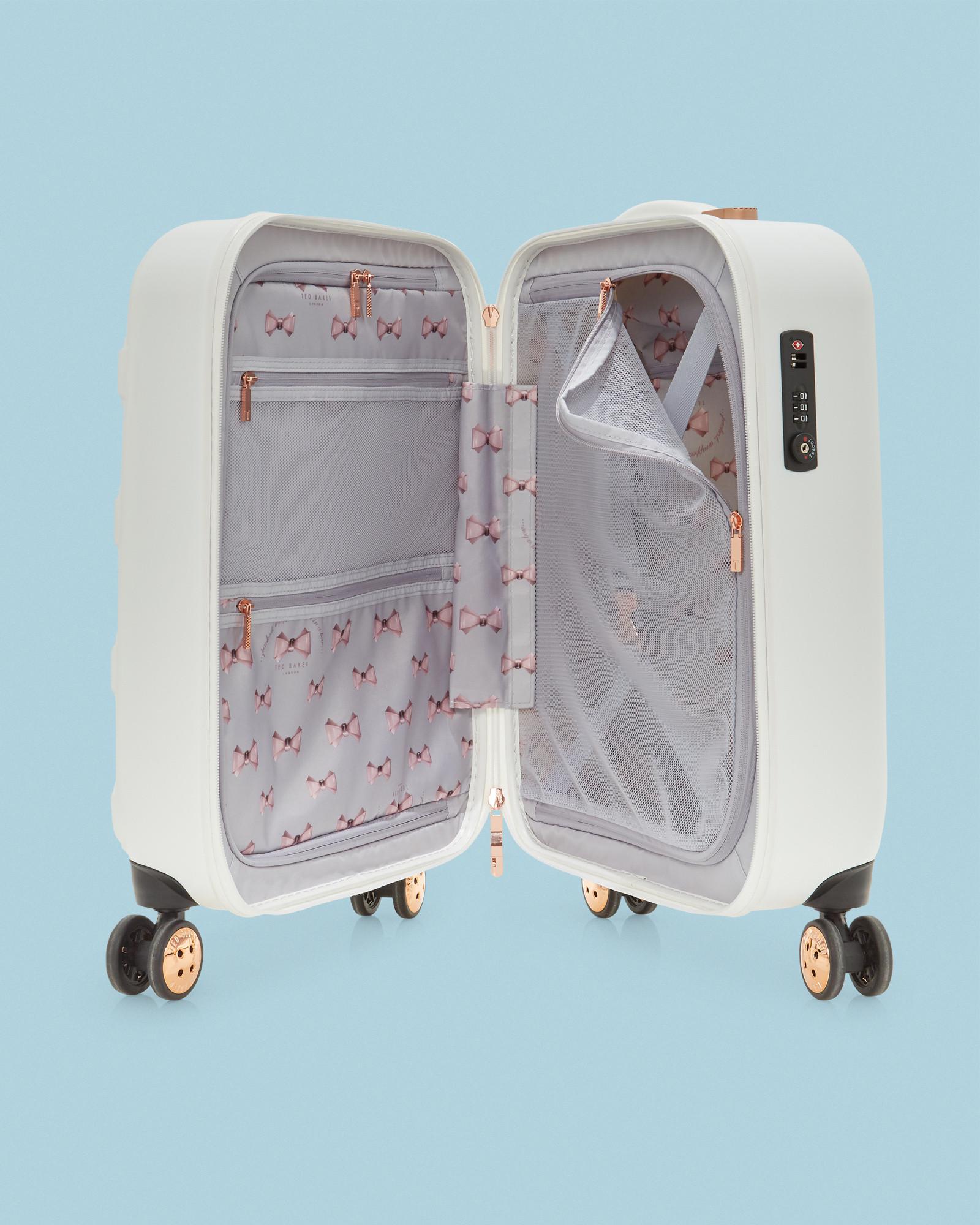small white suitcase