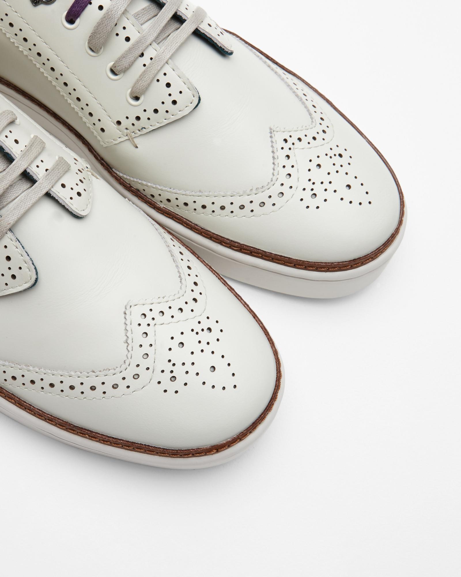 white brogue trainers