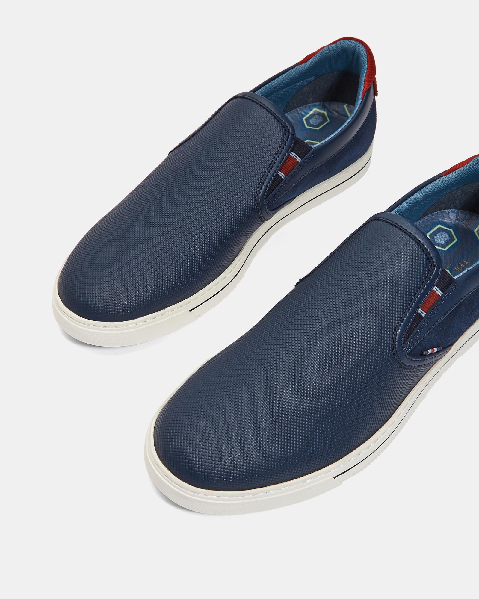 navy blue slip on trainers