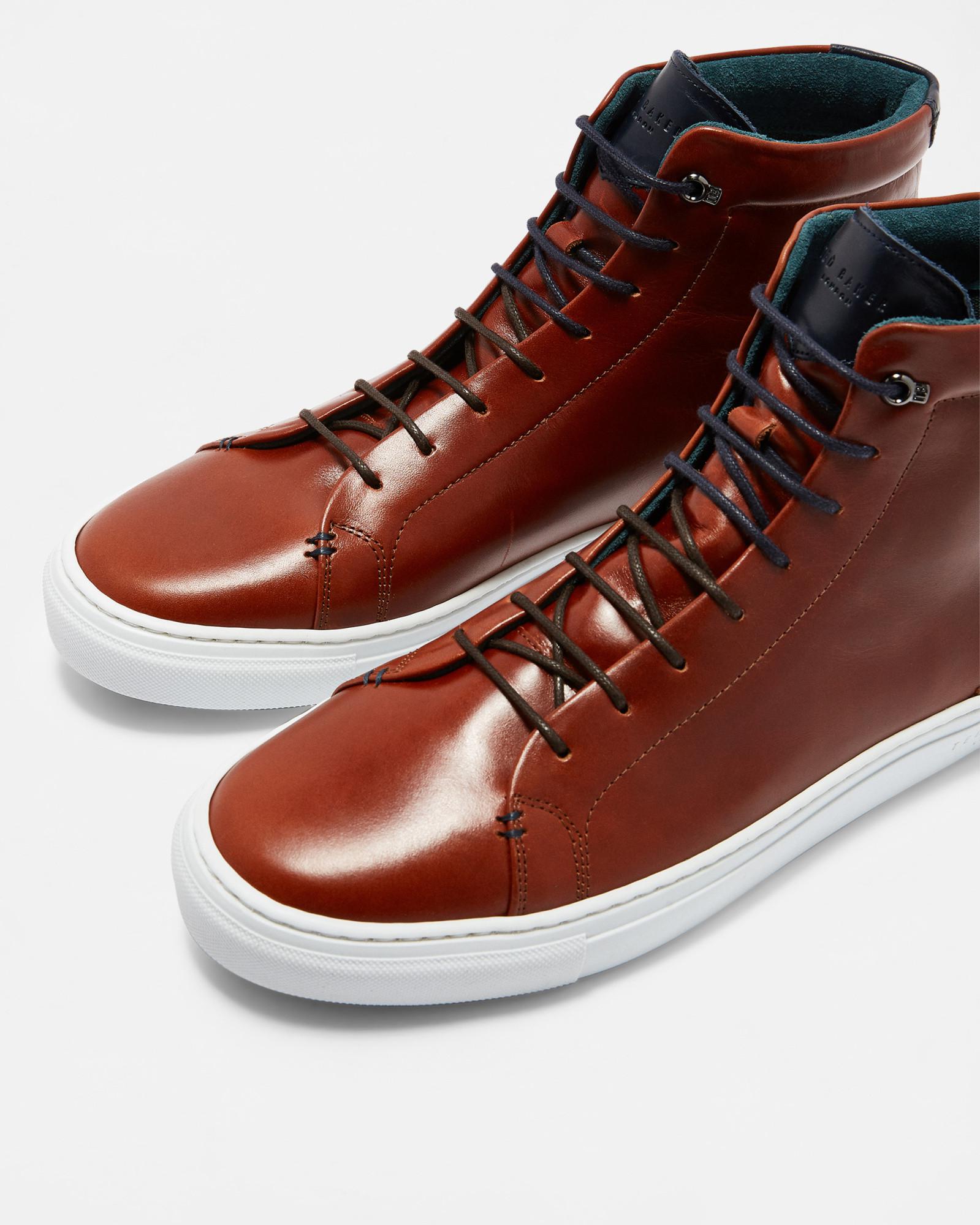 tan leather high top sneakers