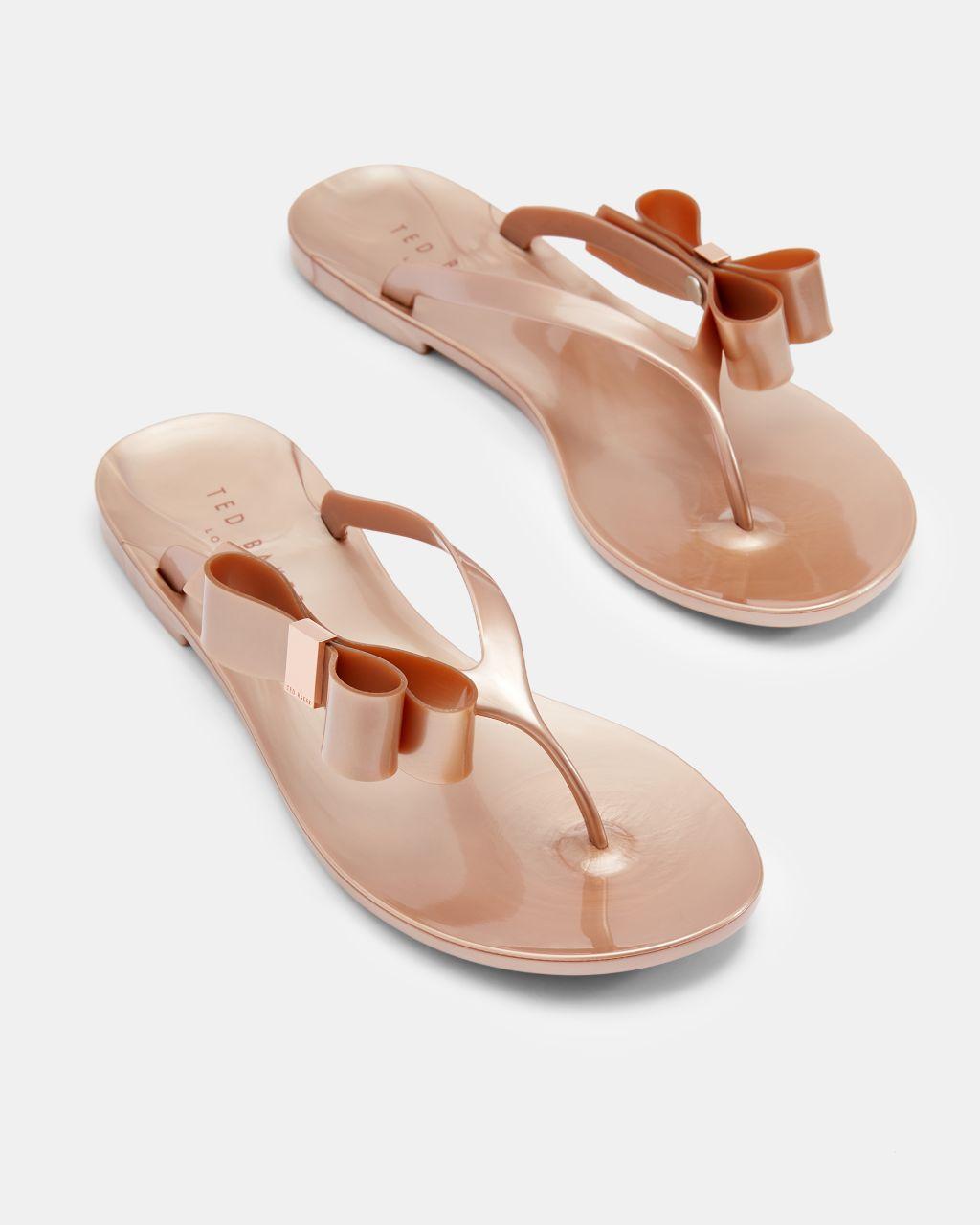jelly flip flops with bow detail